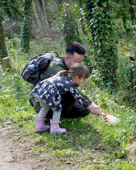 Adult and child with net 